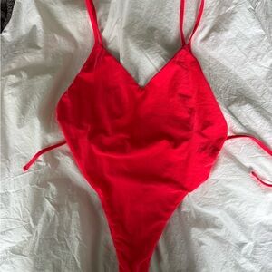 Jolyn “Steve” Onesie